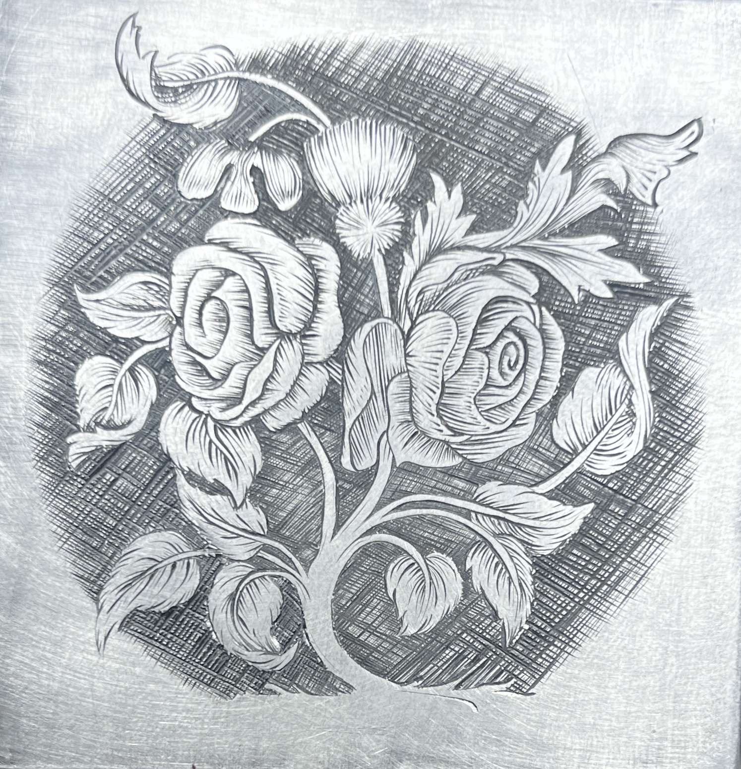 Bouquet of flowers engraved on a steel plate